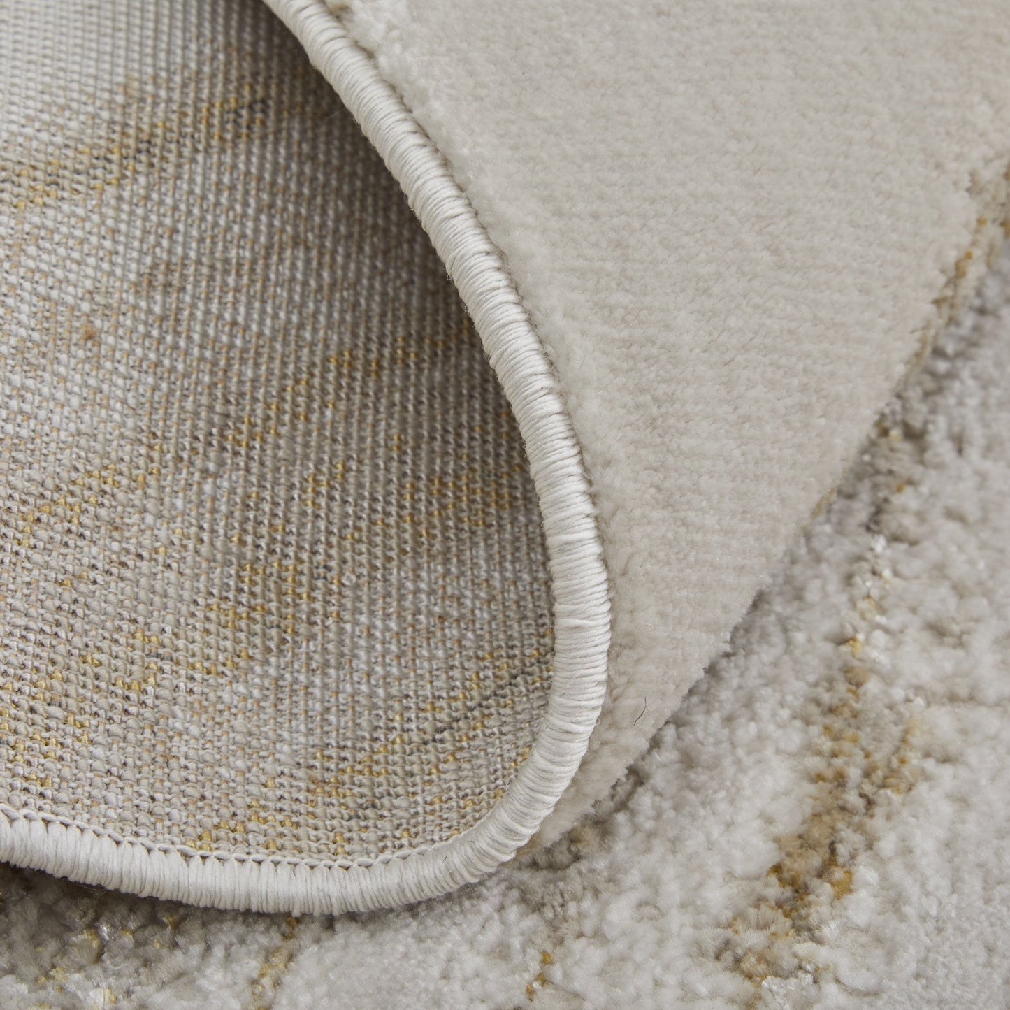 8' X 10' Ivory Brown and Gold Abstract Power Loom Area Rug